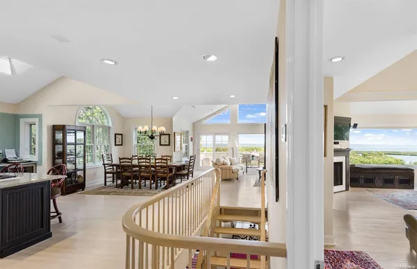 a view of a living room and kitchen view