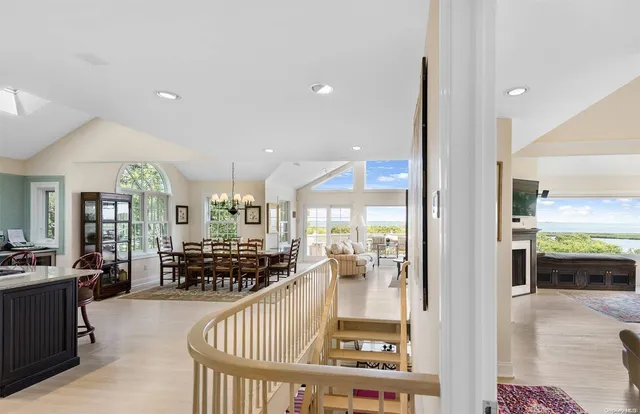 a view of a living room and kitchen view