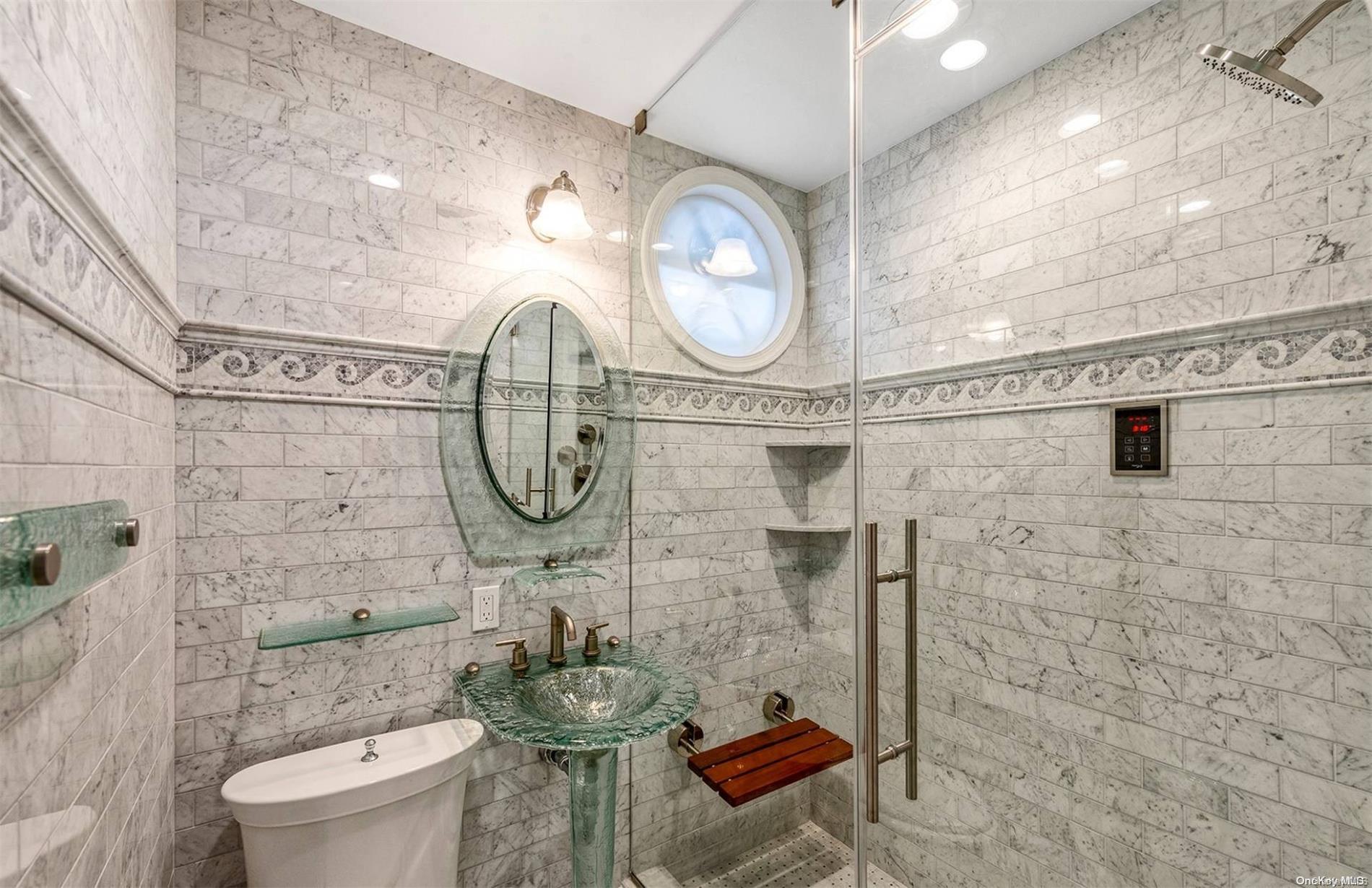 134 Middle Pond Road Southampton, NY 11968 - Photo 26 of 32 a bathroom with a toilet and a shower