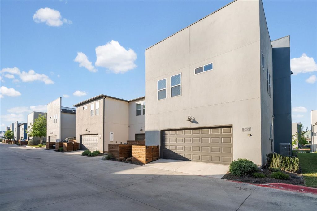 9015 Cattle Baron Path, Unit 705 Austin, TX 78747 - Photo 5 of 35 a view of a house with a patio