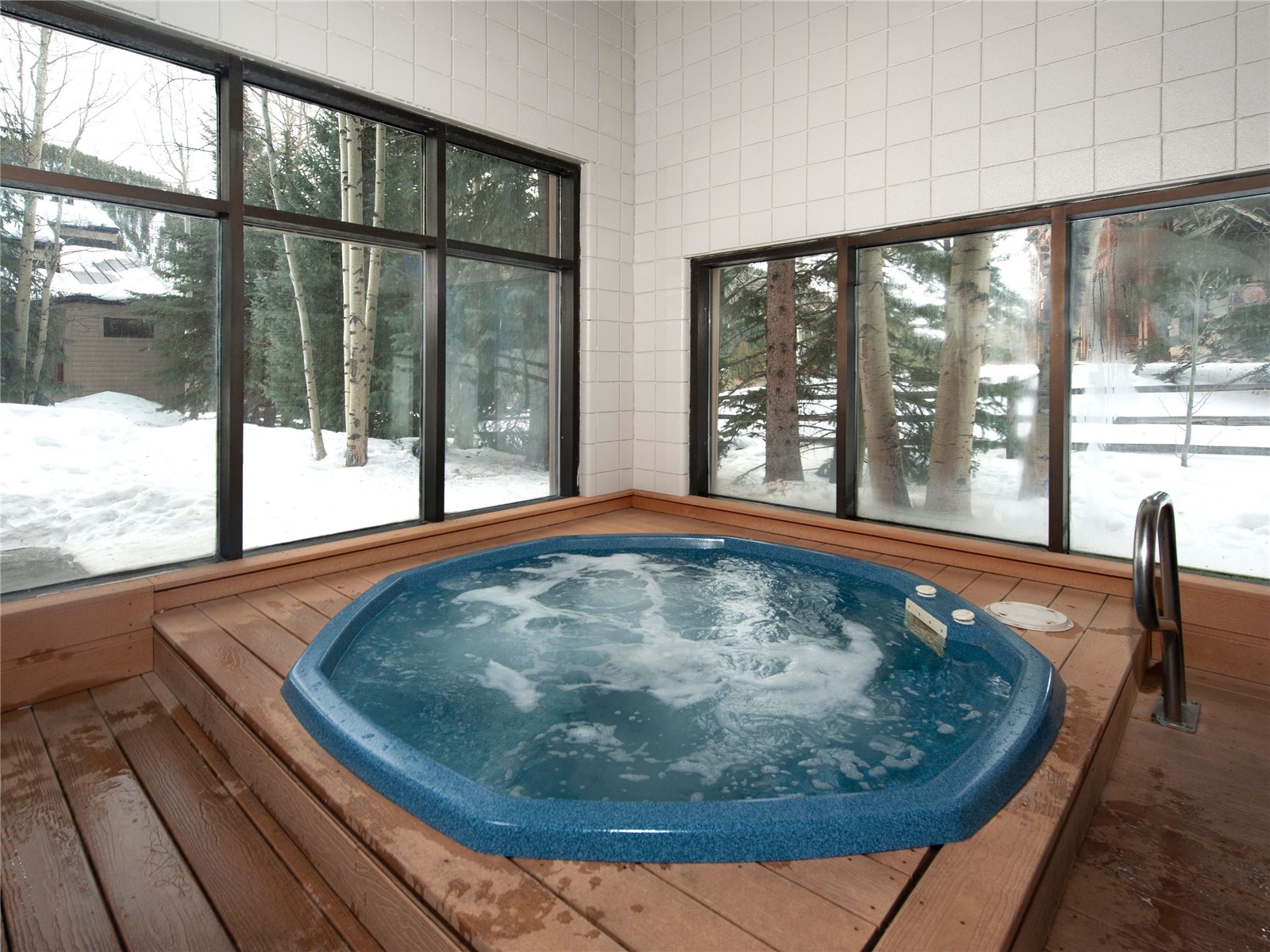 22804 Highway 6, Unit 102 Keystone, CO 80435 - Photo 32 of 34 a view of a swimming pool with an outdoor seating