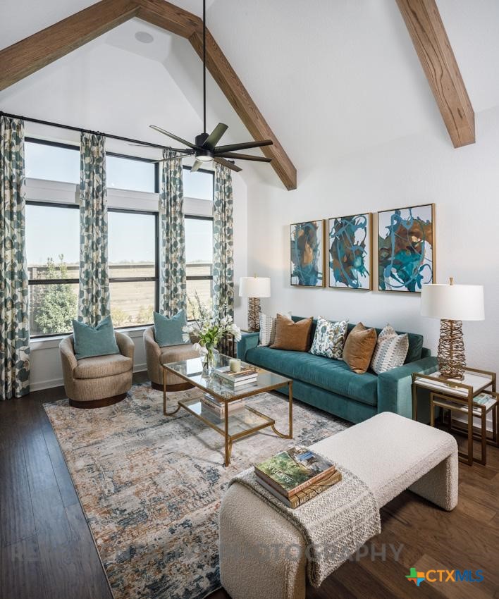 9212 Boathouse Drive Austin, TX 78744 - Photo 14 of 40 a living room with furniture and a large window