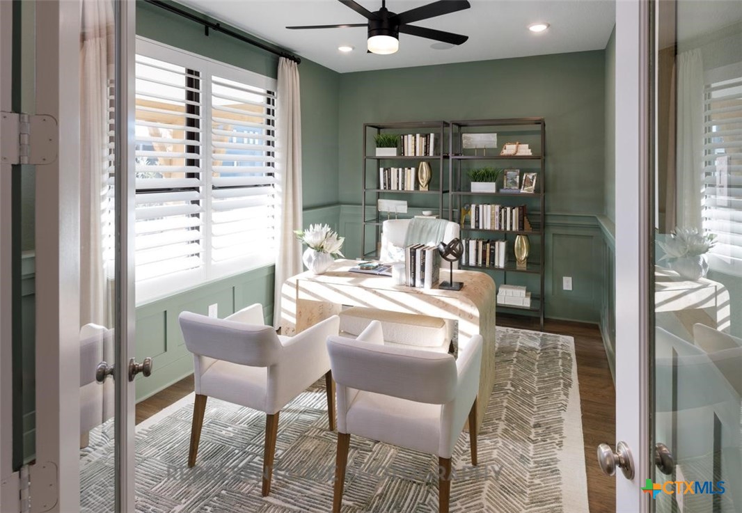 9212 Boathouse Drive Austin, TX 78744 - Photo 27 of 40 a dining room with furniture and a floor to ceiling window