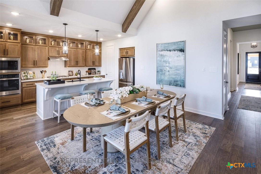 9212 Boathouse Drive Austin, TX 78744 - Photo 32 of 40 a view of a dining room with furniture