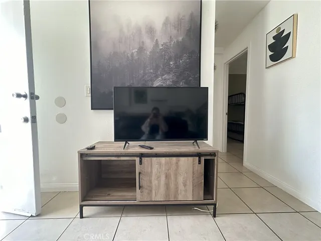 a stove top oven sitting inside of a kitchen
