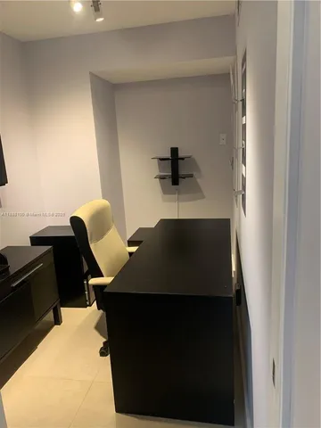 a workspace with furniture and view