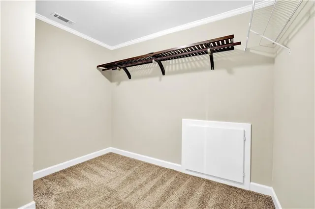 a view of a room with racks on the wall