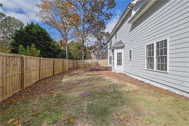 a view of backyard and tree