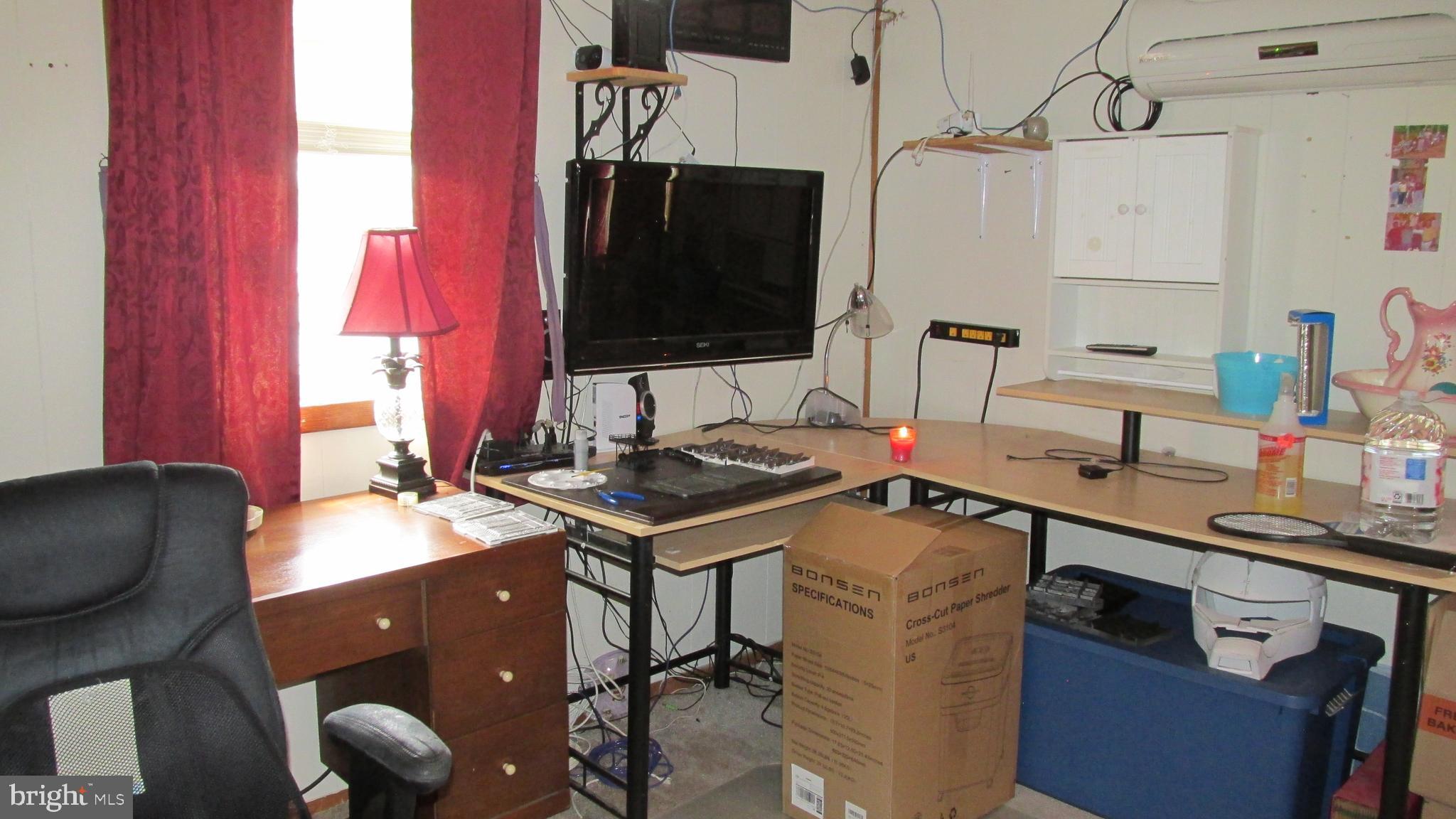 4897 Briggs Road Huntingdon, PA 16652 - Photo 21 of 29 a bathroom with a sink and a mirror