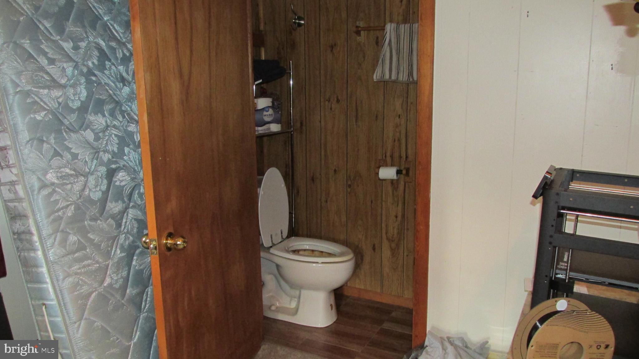 4897 Briggs Road Huntingdon, PA 16652 - Photo 22 of 29 a bathroom with a toilet and a sink