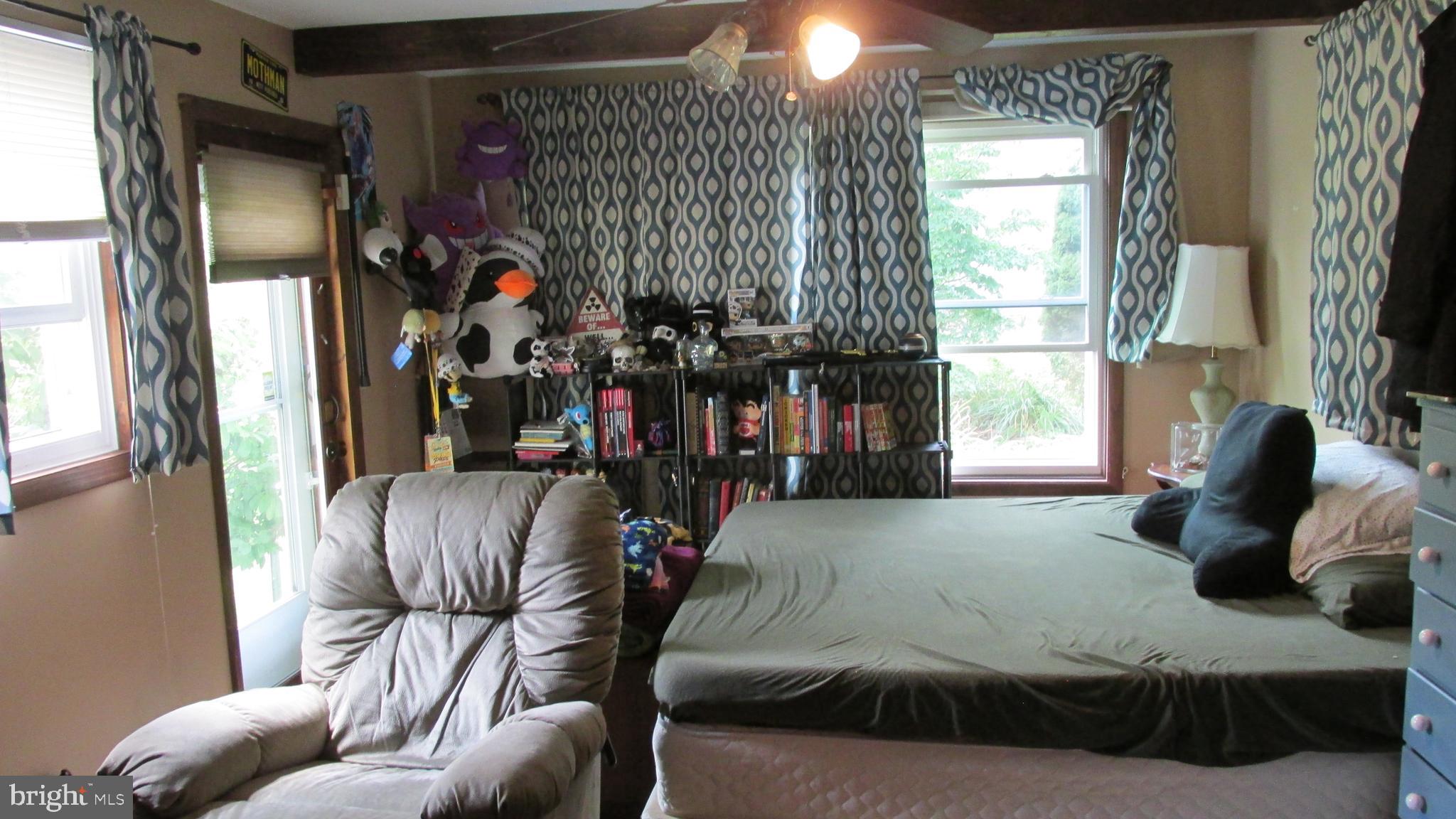4897 Briggs Road Huntingdon, PA 16652 - Photo 24 of 29 a living room with furniture and a window