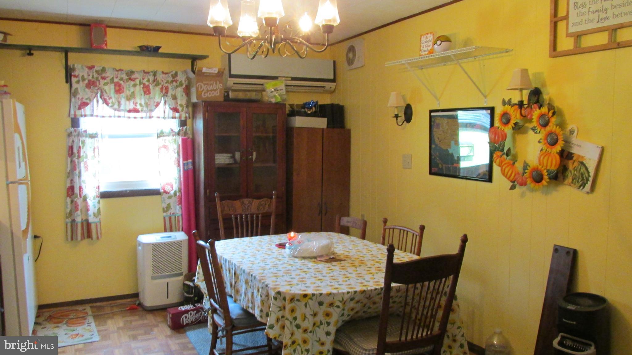 4897 Briggs Road Huntingdon, PA 16652 - Photo 28 of 29 a dining room with furniture and window