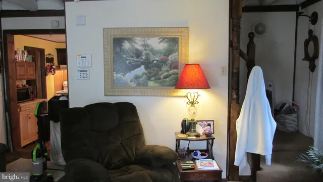 a living room with furniture and a couch