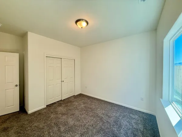 an empty room with windows