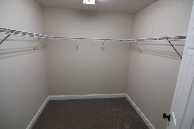 a view of a room with racks on the wall