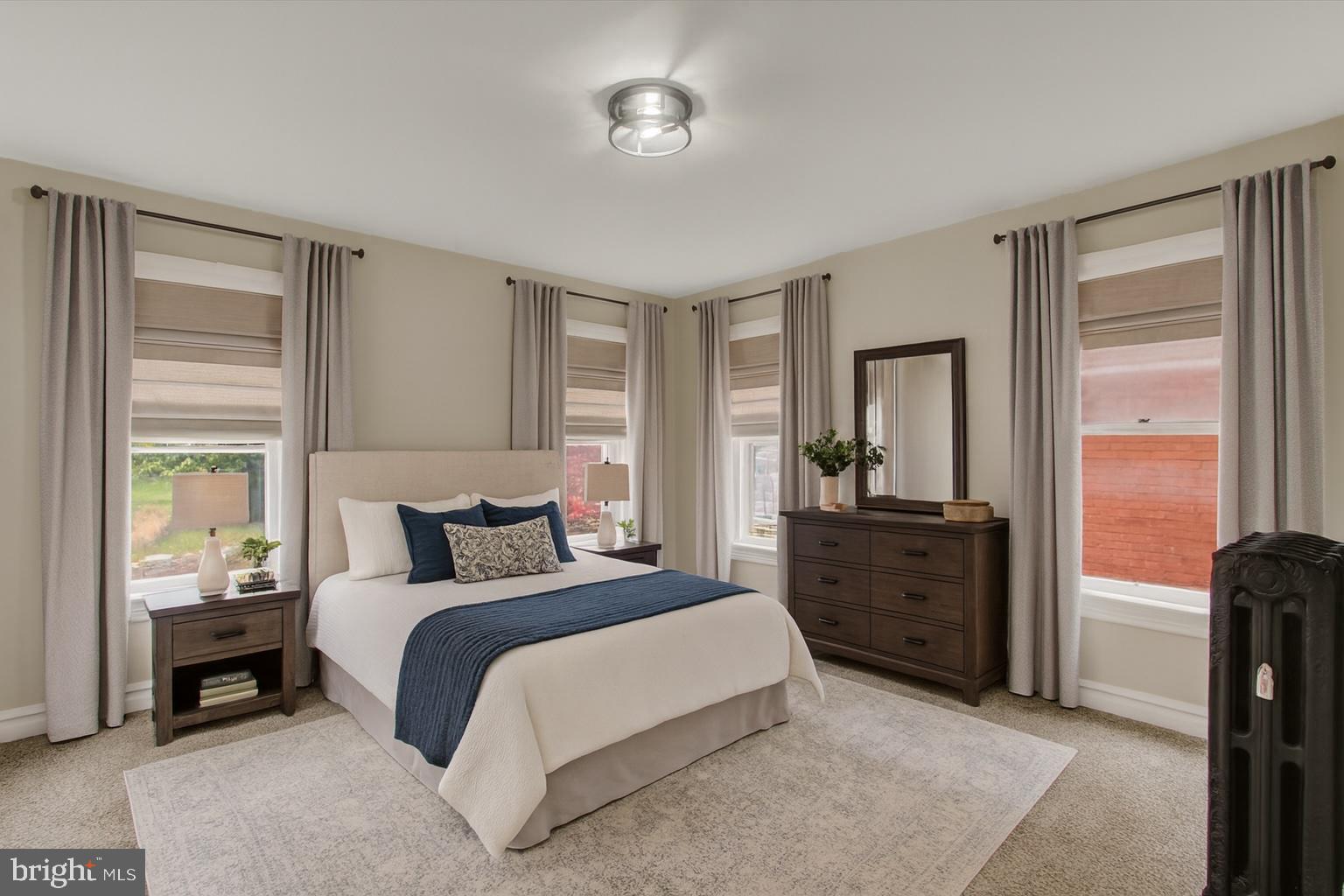 551 York Street Hanover, PA 17331 - Photo 12 of 24 a bedroom with a bed and wooden floor