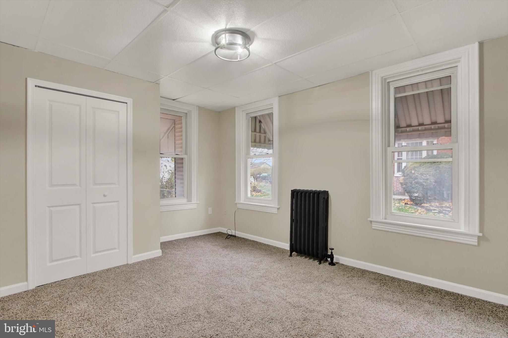 551 York Street Hanover, PA 17331 - Photo 13 of 24 an empty room with windows and closet