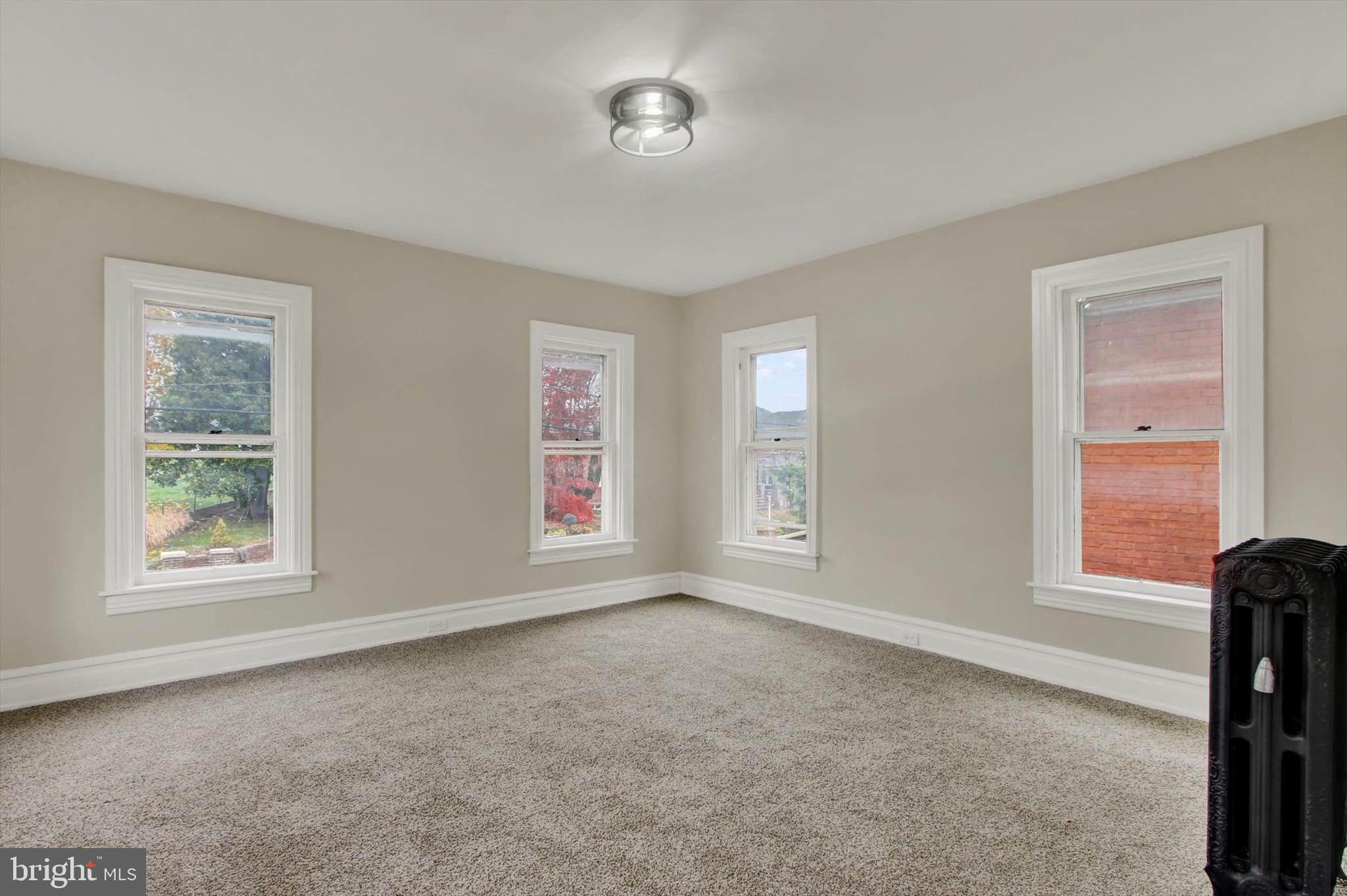 551 York Street Hanover, PA 17331 - Photo 16 of 24 a view of an empty room with a window