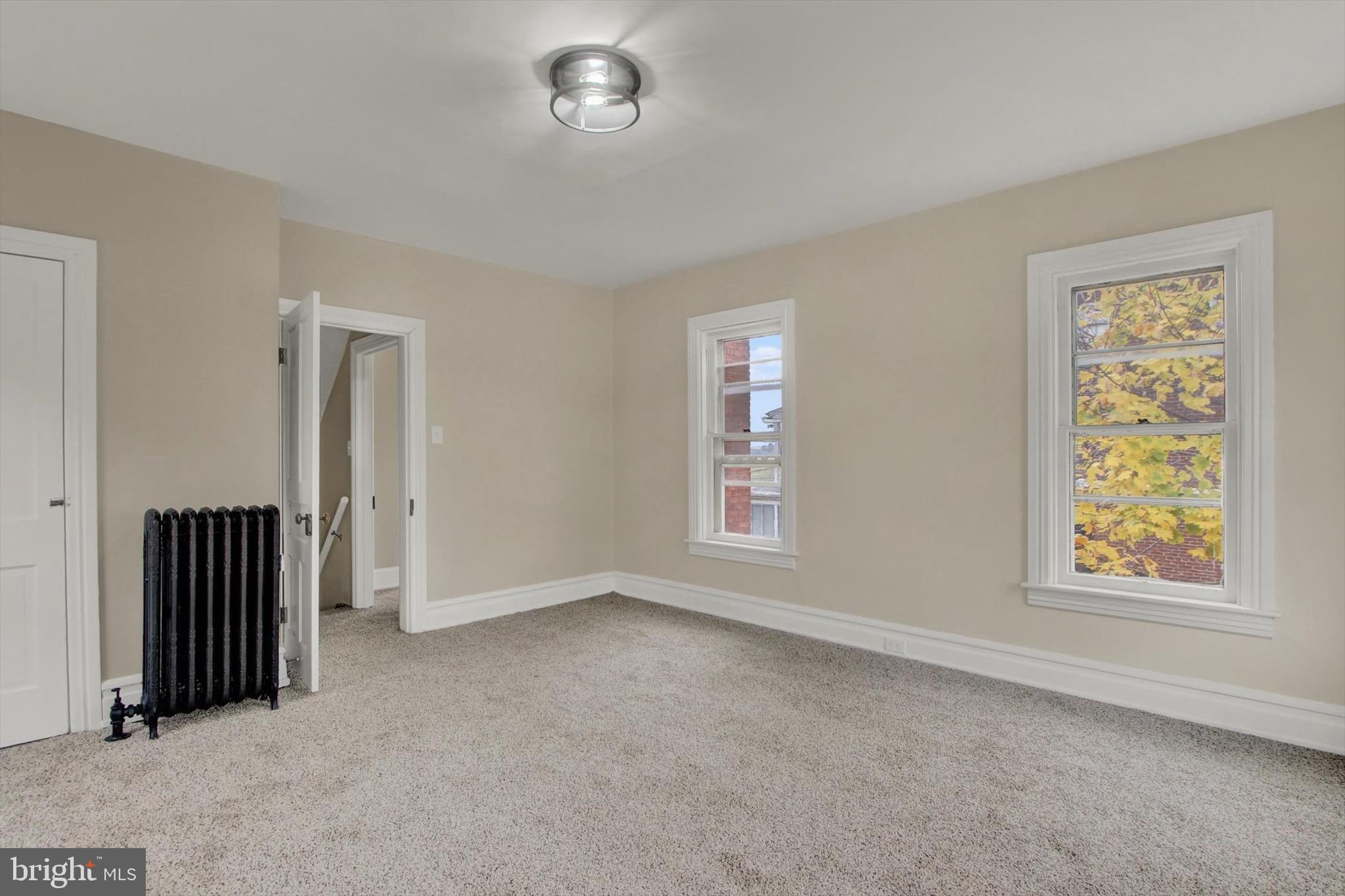 551 York Street Hanover, PA 17331 - Photo 17 of 24 an empty room with windows