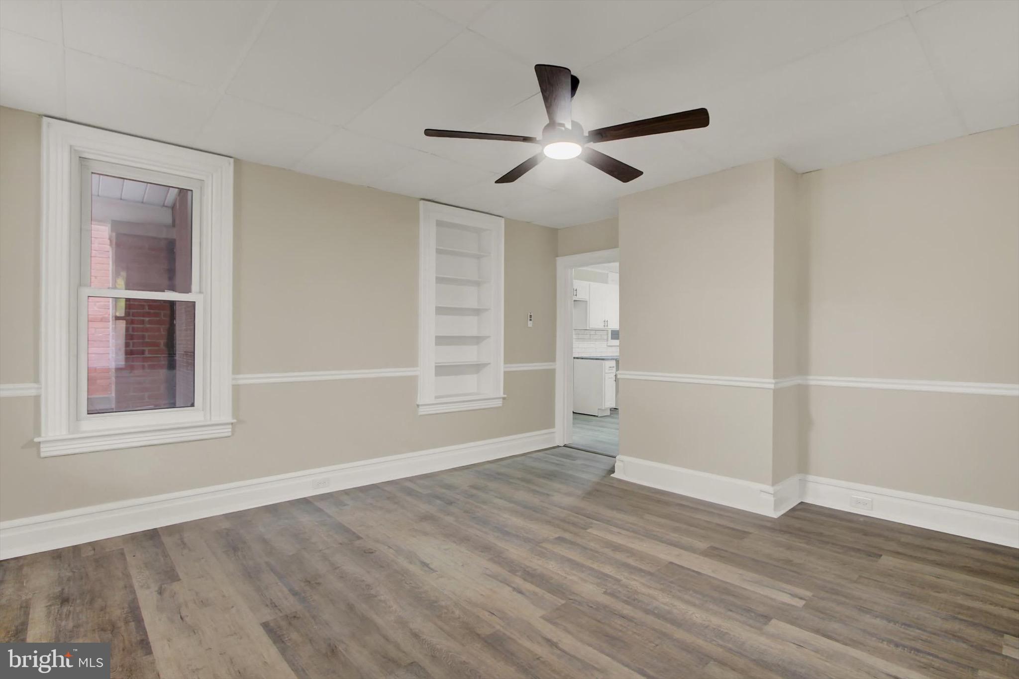 551 York Street Hanover, PA 17331 - Photo 6 of 24 a view of empty room with wooden floor and fan