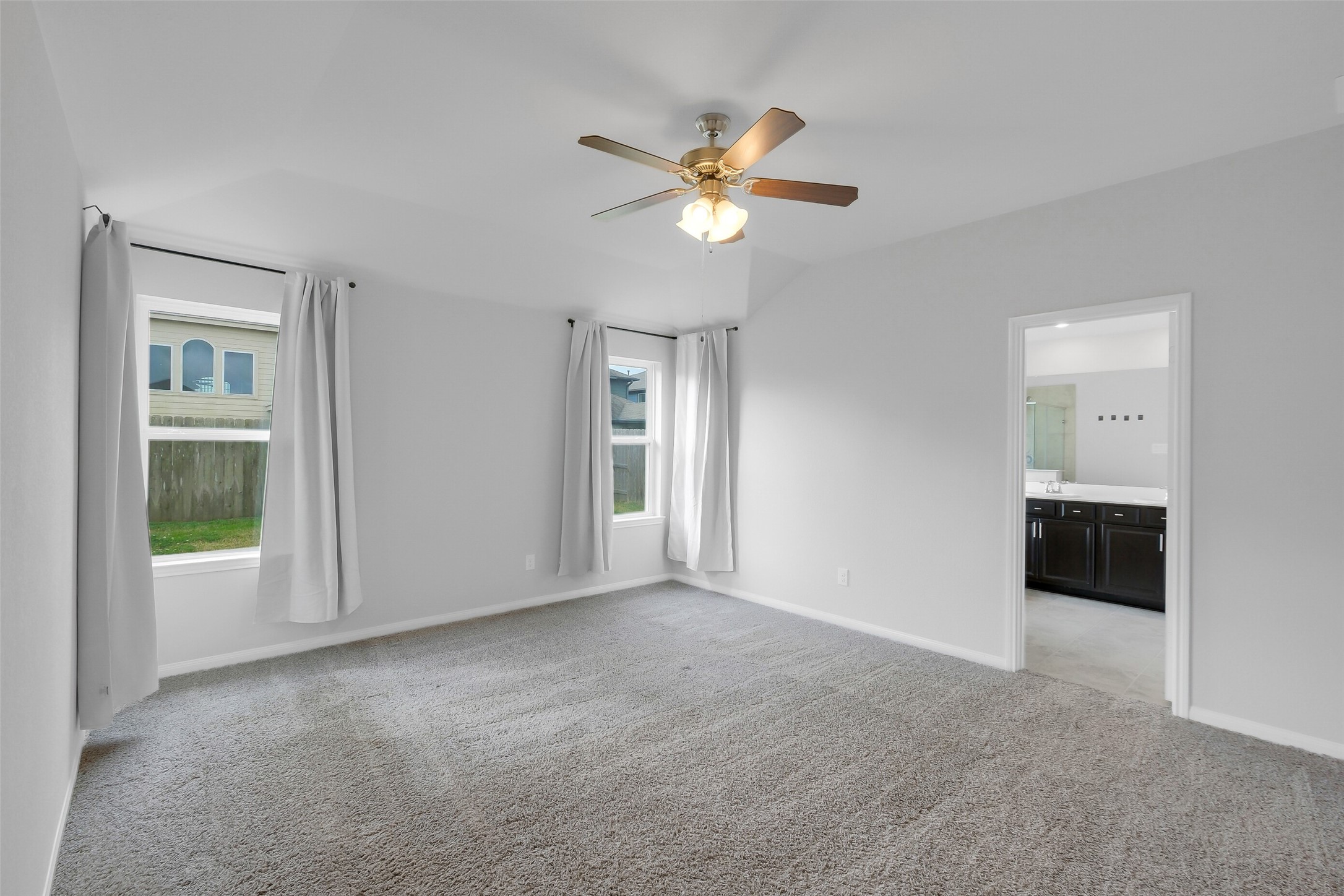 2442 Goddard Grn Drive Rosharon, TX 77583 - Photo 16 of 34 a view of a livingroom with a ceiling fan and window