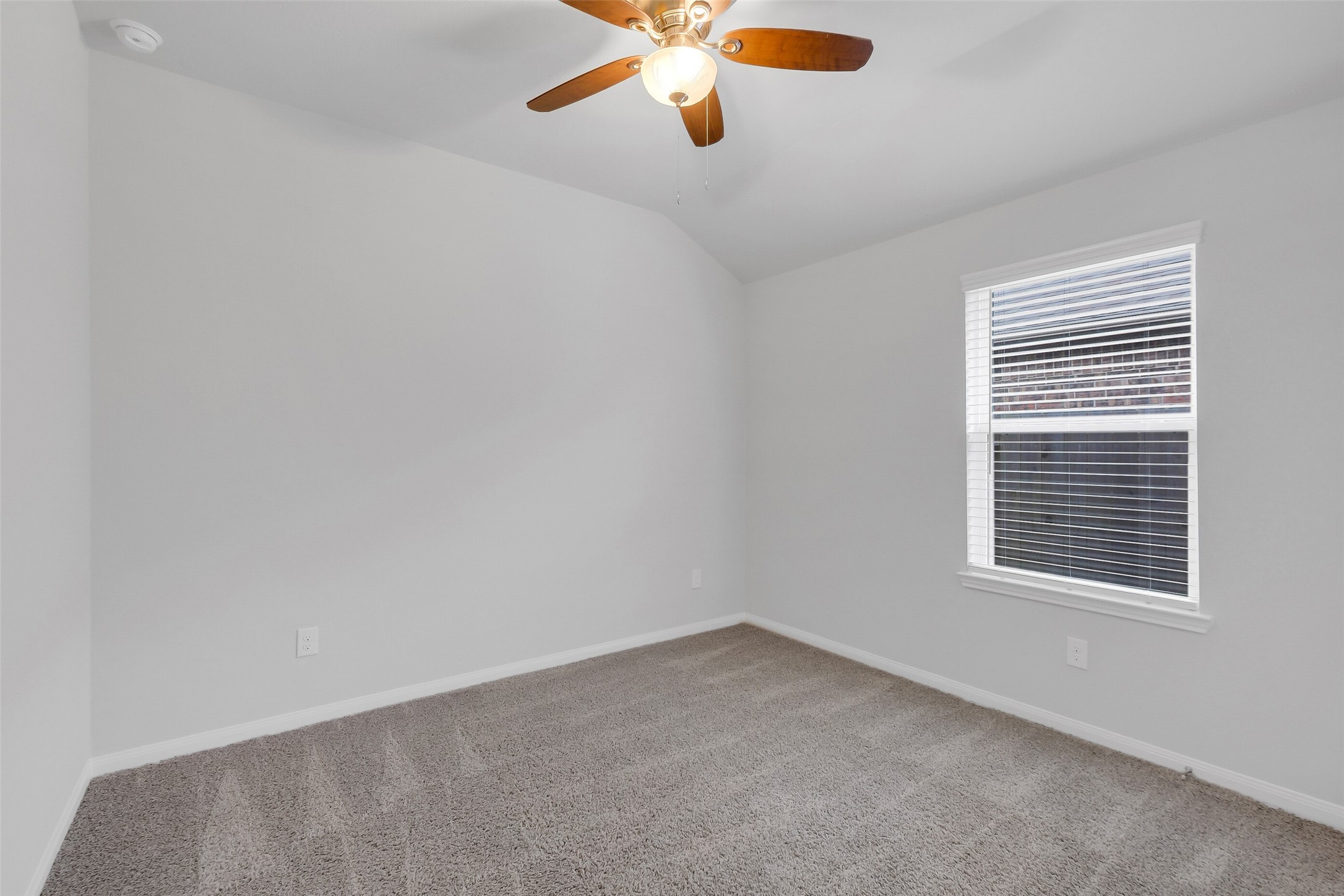 2442 Goddard Grn Drive Rosharon, TX 77583 - Photo 20 of 34 an empty room with windows and fan
