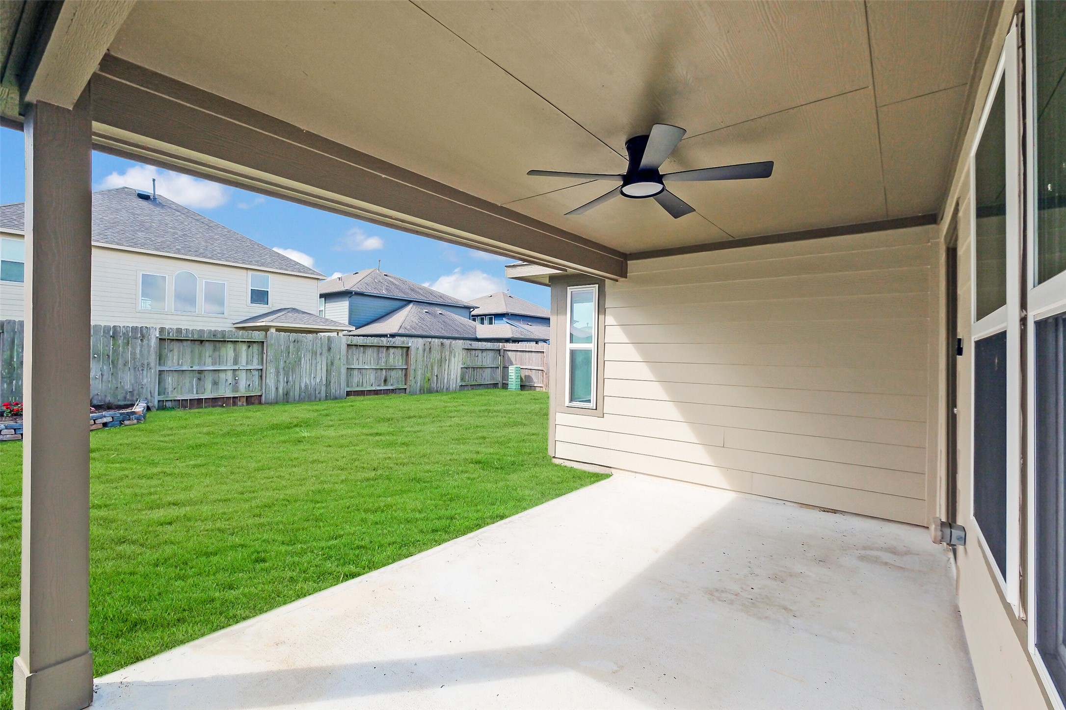 2442 Goddard Grn Drive Rosharon, TX 77583 - Photo 24 of 34 a view of a porch with a backyard