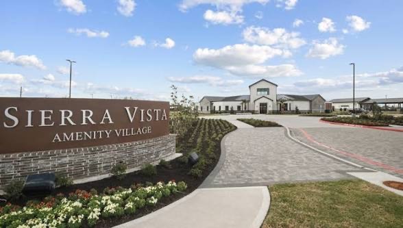 2442 Goddard Grn Drive Rosharon, TX 77583 - Photo 31 of 34 a view of a street with a building in the background