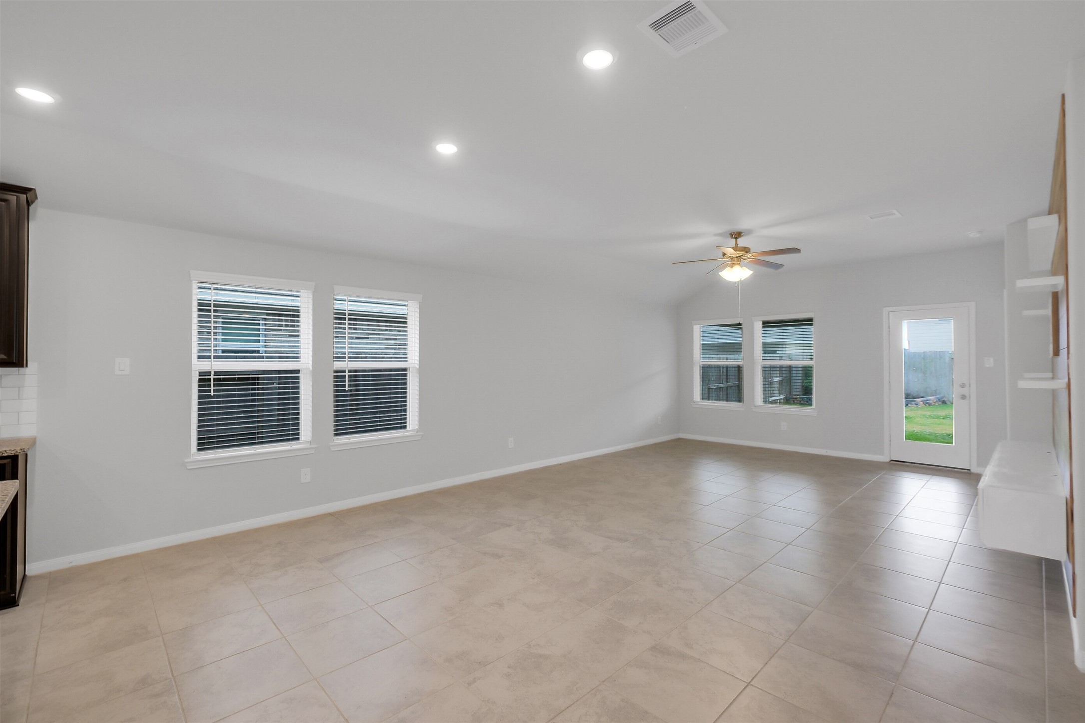 2442 Goddard Grn Drive Rosharon, TX 77583 - Photo 10 of 34 a view of an empty room with a window