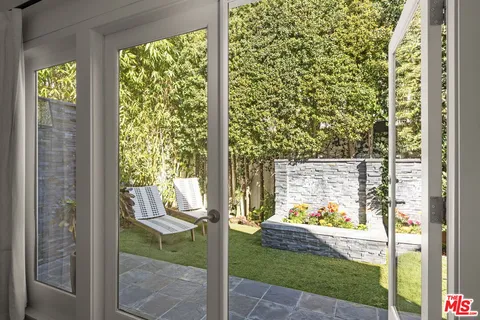 a view of a porch with a door and a porch
