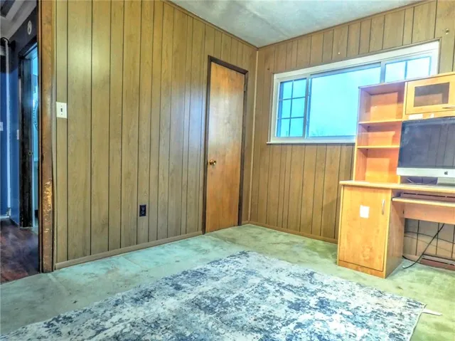 a view of a big room with windows