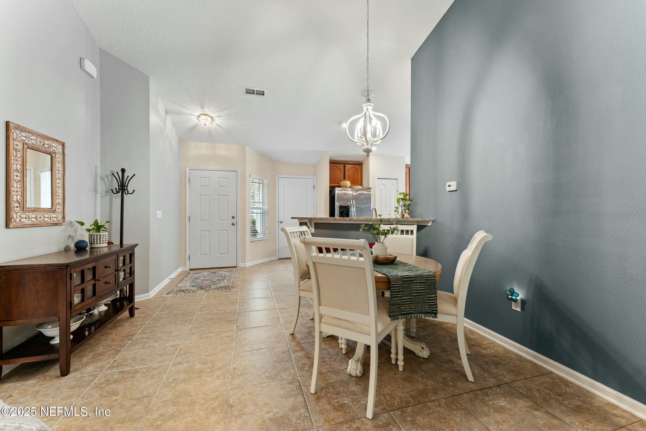 340 Sunshine Drive St. Augustine, FL 32086 - Photo 18 of 44 a view of a dining room with furniture
