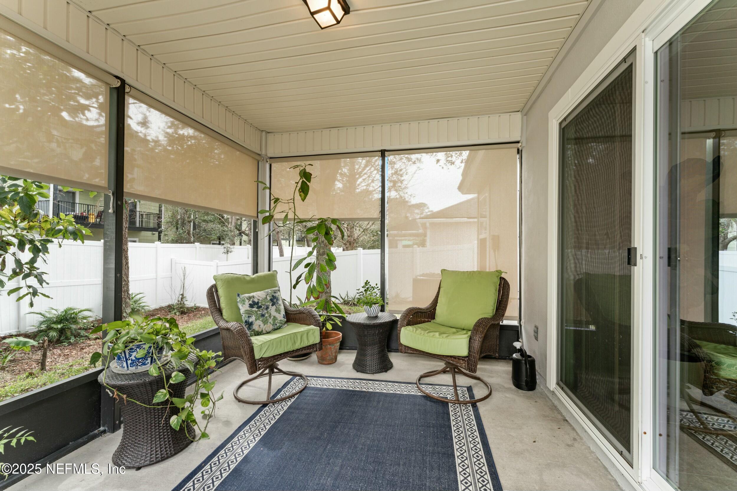340 Sunshine Drive St. Augustine, FL 32086 - Photo 31 of 44 a building outdoor space with furniture and garden view