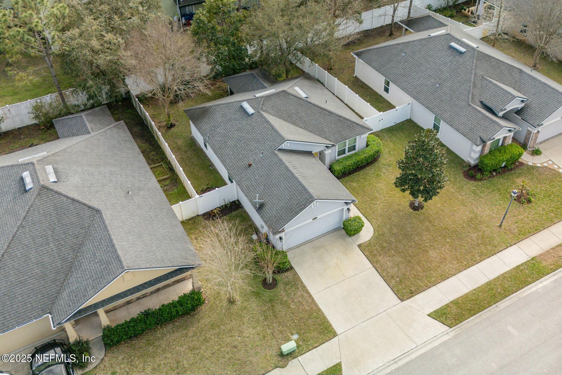 340 Sunshine Drive St. Augustine, FL 32086 - Photo 35 of 44 an aerial view of a house with a yard