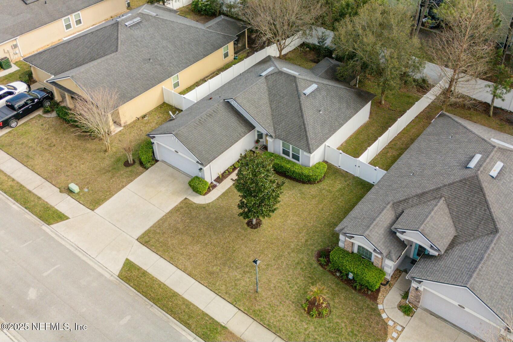 340 Sunshine Drive St. Augustine, FL 32086 - Photo 36 of 44 an aerial view of residential houses with outdoor space