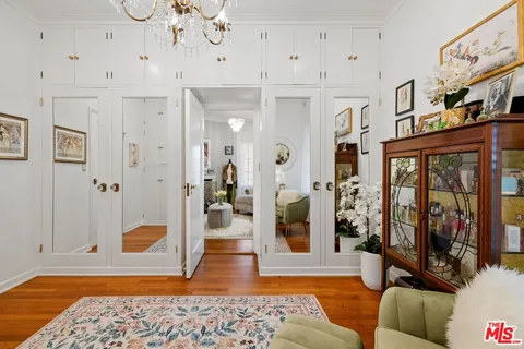 a living room with furniture and a rug