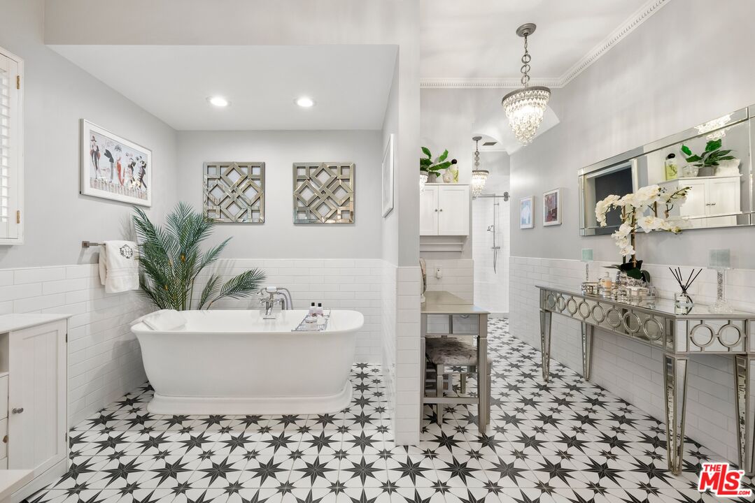 820 North Verano Drive Glendora, CA 91741 - Photo 19 of 50 a white bath tub sitting in a bathroom next to a window