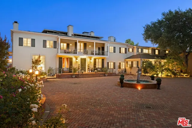 a view of street with flower plants