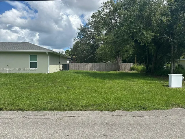 a view of a backyard with a garden
