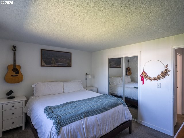 14655 Southwest 76th Avenue, Unit 2 Portland, OR 97224 - Photo 19 of 31 Primary Bedroom