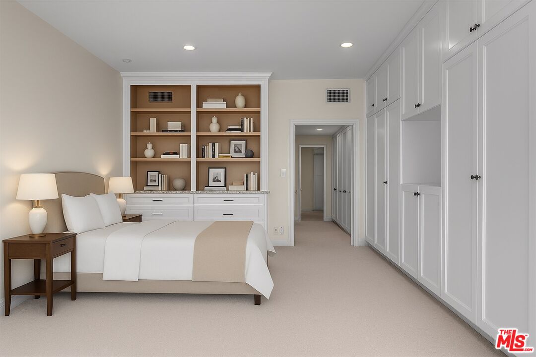 1333 South Beverly Glen Boulevard, Unit 904 Los Angeles, CA 90024 - Photo 11 of 32 a bedroom with a bed and a night stand