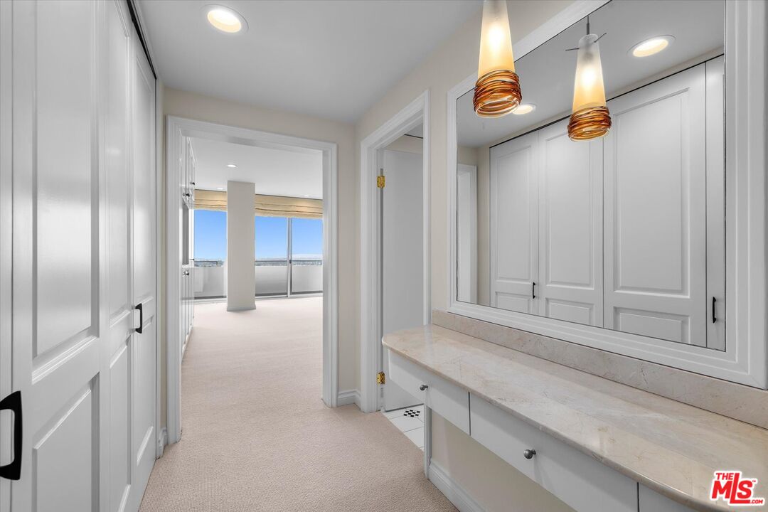 1333 South Beverly Glen Boulevard, Unit 904 Los Angeles, CA 90024 - Photo 14 of 32 a bathroom with a shower and a sink