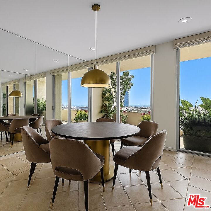 1333 South Beverly Glen Boulevard, Unit 904 Los Angeles, CA 90024 - Photo 15 of 32 a view of a dining room with furniture window and outside view