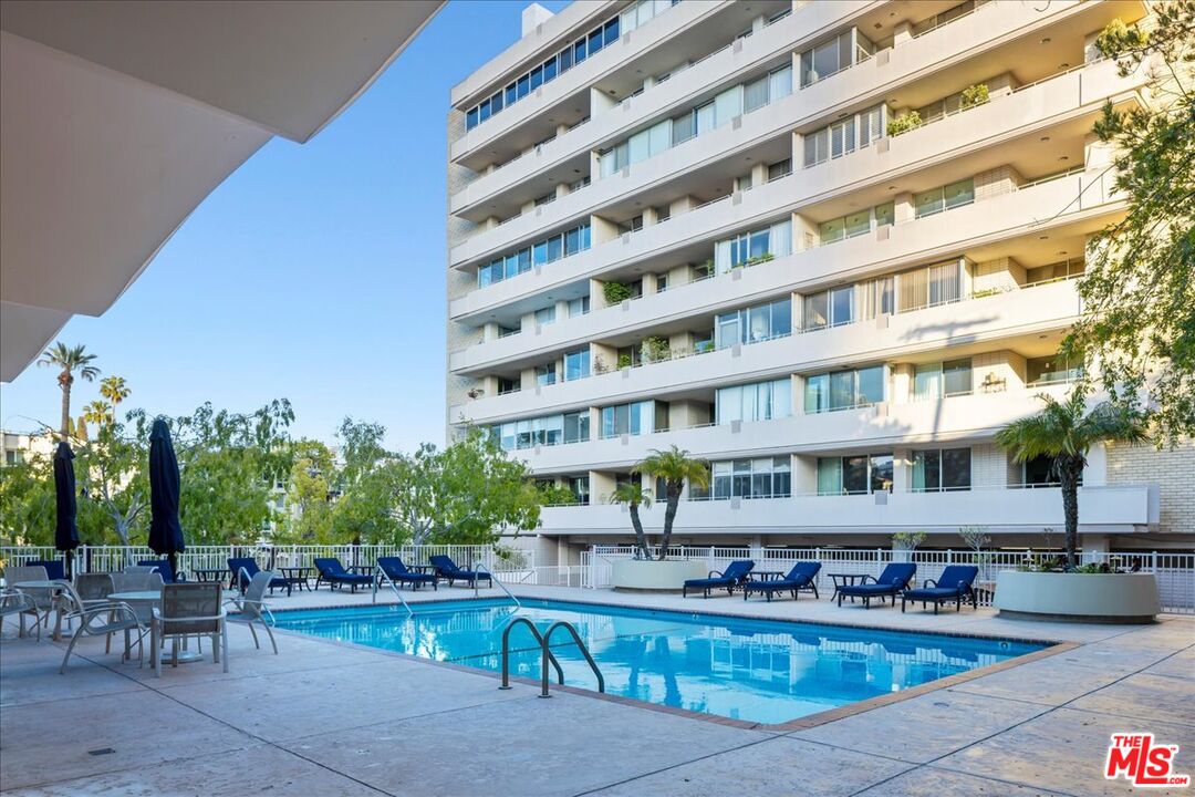 1333 South Beverly Glen Boulevard, Unit 904 Los Angeles, CA 90024 - Photo 28 of 32 a front view of a building with outdoor seating