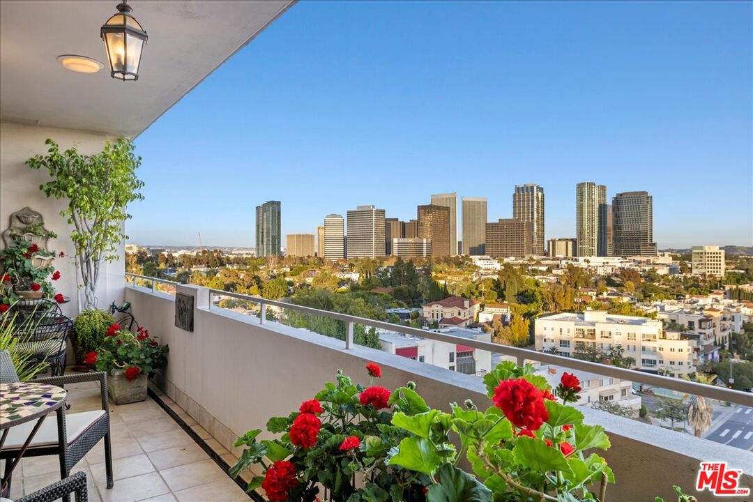 1333 South Beverly Glen Boulevard, Unit 904 Los Angeles, CA 90024 - Photo 3 of 32 a city view from a balcony