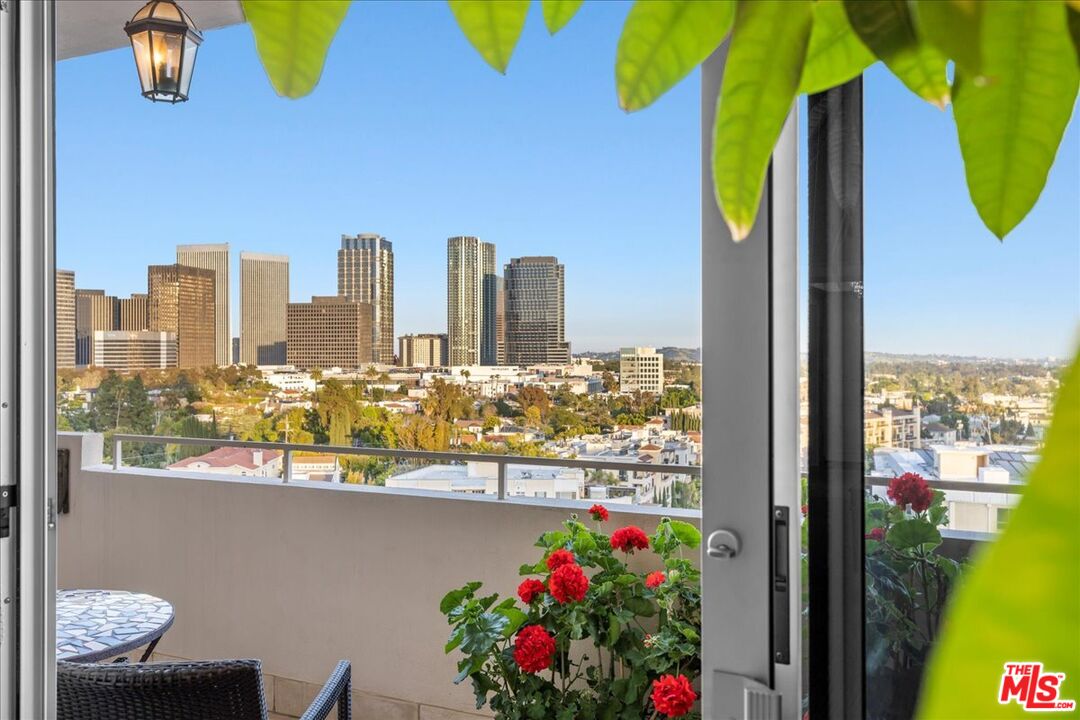 1333 South Beverly Glen Boulevard, Unit 904 Los Angeles, CA 90024 - Photo 4 of 32 a view of swimming pool from a balcony