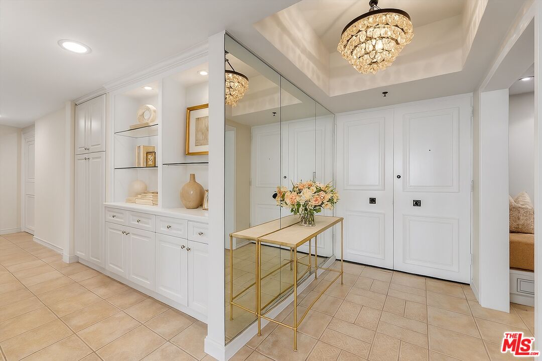 1333 South Beverly Glen Boulevard, Unit 904 Los Angeles, CA 90024 - Photo 5 of 32 a view of a hallway to a bedroom