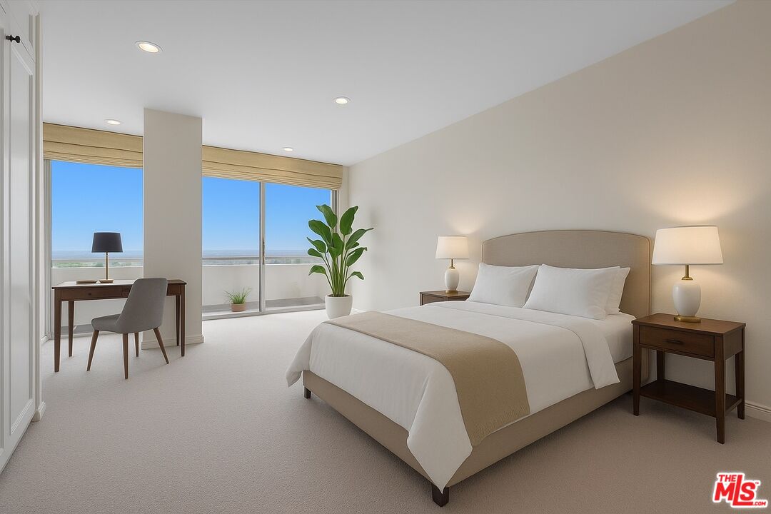 1333 South Beverly Glen Boulevard, Unit 904 Los Angeles, CA 90024 - Photo 10 of 32 a bedroom with a bed and a table