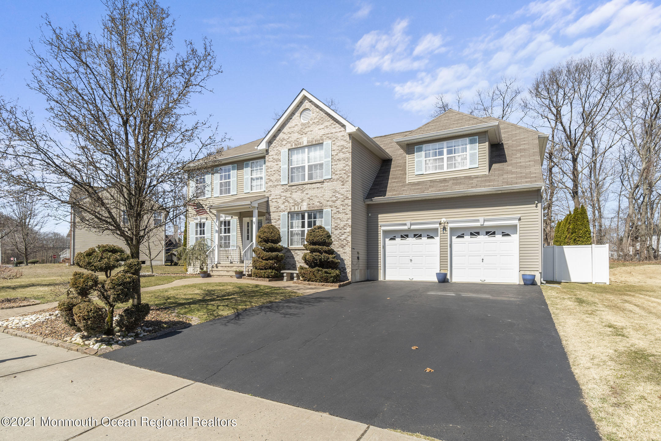 9 Rutgers Drive Howell, NJ 07731 - Photo 2 of 45 a view of a house with a large windows and large tree