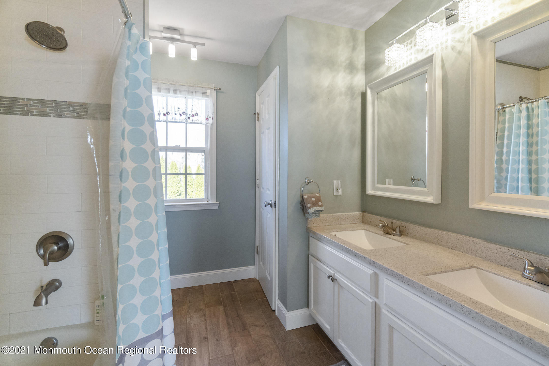 9 Rutgers Drive Howell, NJ 07731 - Photo 24 of 45 a bathroom with a granite countertop double vanity sink a mirror and a bathtub